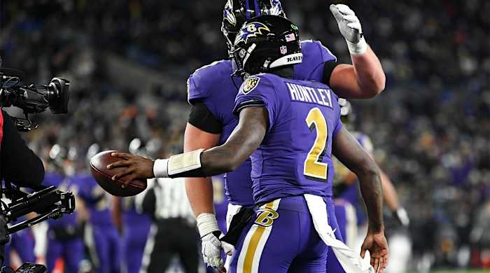 Dec 19, 2021; Baltimore, Maryland, USA; Baltimore Ravens quarterback Tyler Huntley (2) celebrates with tight end Mark Andrews (89) after scoring a touchdown during during the second half against the Green Bay Packersat M&T Bank Stadium.